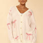 All over bow knit cardigan